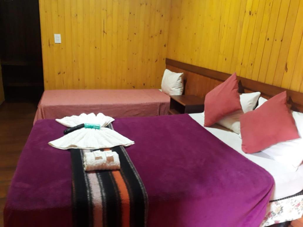 Petit Hotel Caraguata Puerto Iguazu Bagian luar foto